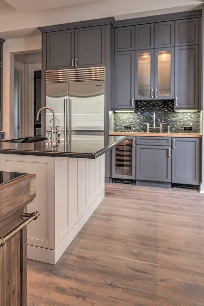 kitchen with wood floor and contrasting blue cabinets